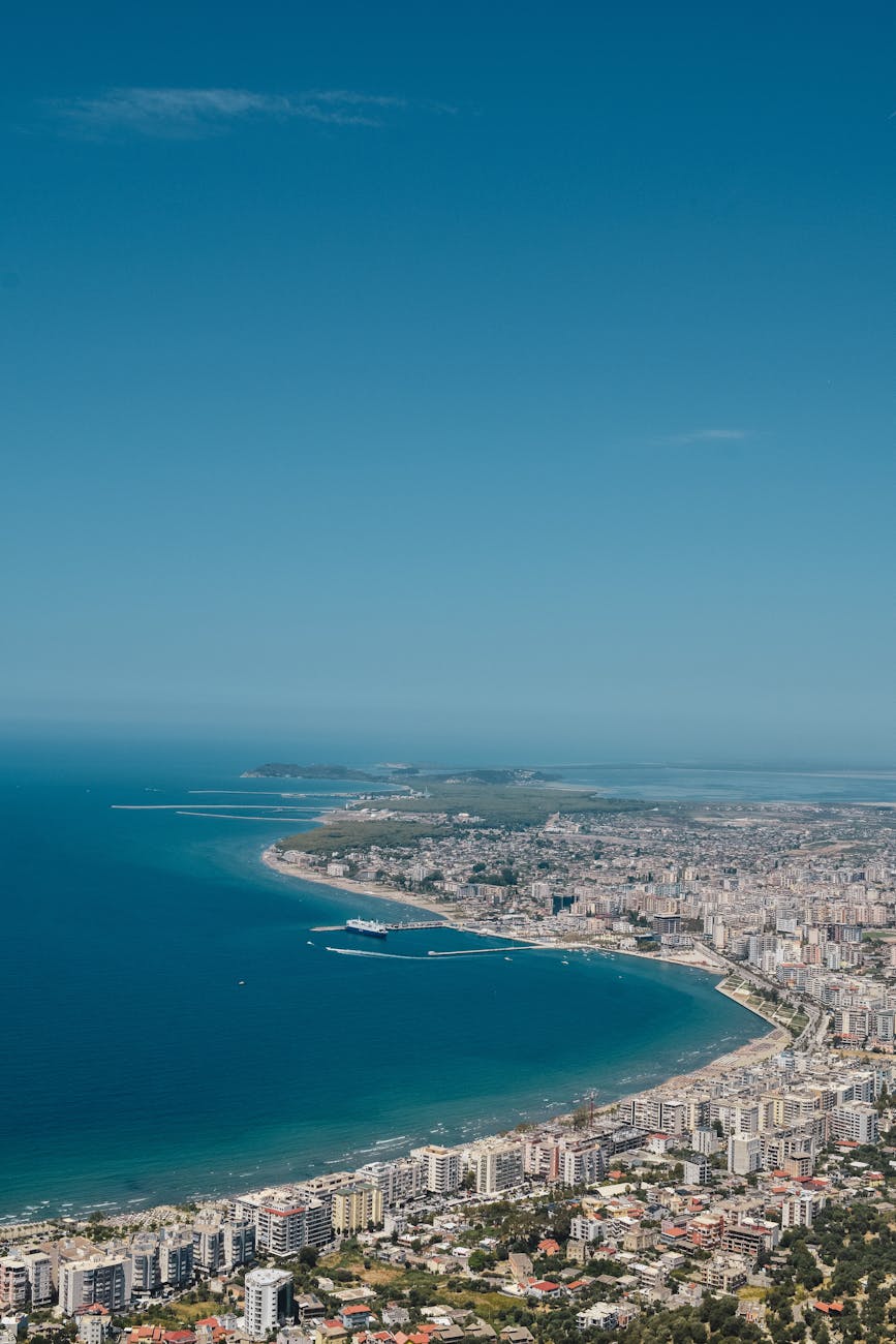the view from the top of a mountain overlooking the city