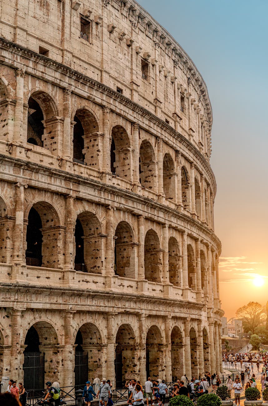 colosseum at sunset in rome italy